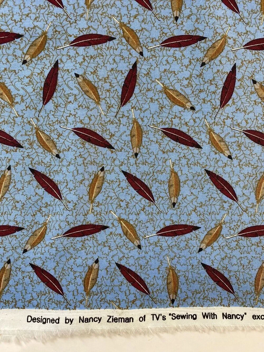 Nancy Zieman Cotton Fabric Cardinal Blue/Rust Feathers Fabrics Batch 119034